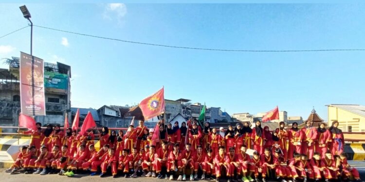 Syiar Milad ke-62, Tapak Suci Jember Gelar Long March dan Ukir Prestasi